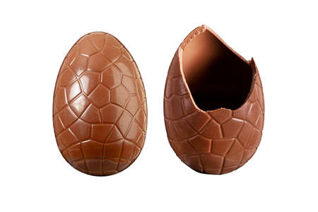 Chocolate Easter egg whole and broken isolated on a white backgroundの写真素材