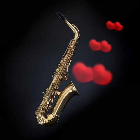 Saxophone with red love hearts coming out of the bell on a black background. Romantic brass music conceptの写真素材