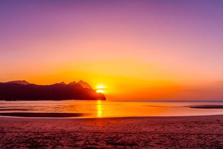 Sunset background, Sunset on the beach in mahoro island, Indonesiaの写真素材