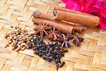 variety of spices on bamboo mat concept and floralの写真素材