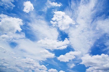 White fluffy cloud over blue sky