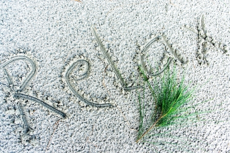 Word Relax on sand beachの写真素材