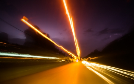 Abstract of light trail at busy roadの写真素材