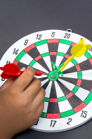 Hand hit dart targetの写真素材