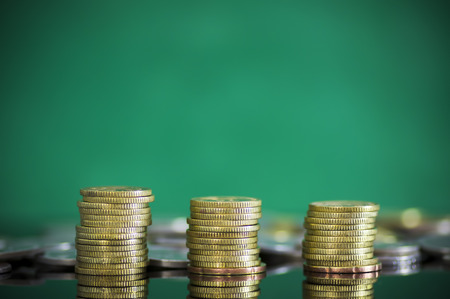 Gold and silver coin close up. Copy space concept for saving fund, financial, banking, investment, money or other your content. Malaysia coins.の写真素材