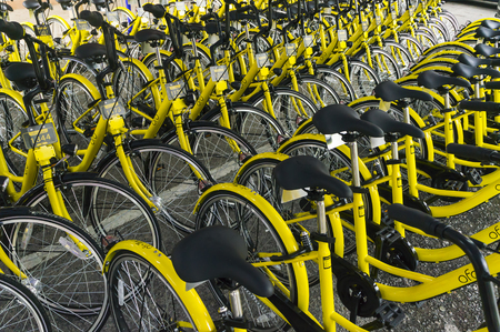 KUALA LUMPUR, MALAYSIA - September 9, 2017 : OFO bicycle close up. Founded in 2014 at China, OFO first in the world to introduce "non-docking" bike sharing platform operated by smartphone application.のeditorial素材