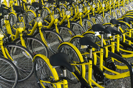KUALA LUMPUR, MALAYSIA - September 9, 2017 : OFO bicycle close up. Founded in 2014 at China, OFO first in the world to introduce "non-docking" bike sharing platform operated by smartphone application.のeditorial素材