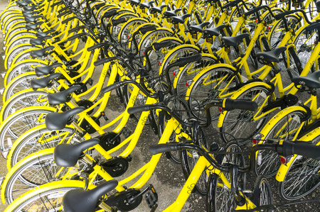 KUALA LUMPUR, MALAYSIA - September 9, 2017 : OFO bicycle close up. Founded in 2014 at China, OFO first in the world to introduce "non-docking" bike sharing platform operated by smartphone application.のeditorial素材