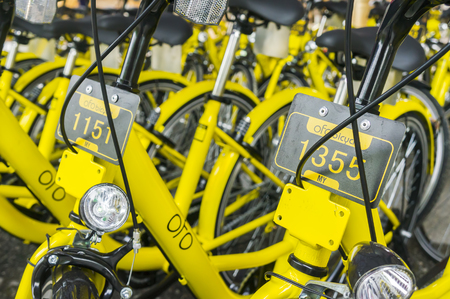 KUALA LUMPUR, MALAYSIA - September 9, 2017 : OFO bicycle close up. Founded in 2014 at China, OFO first in the world to introduce "non-docking" bike sharing platform operated by smartphone application.のeditorial素材