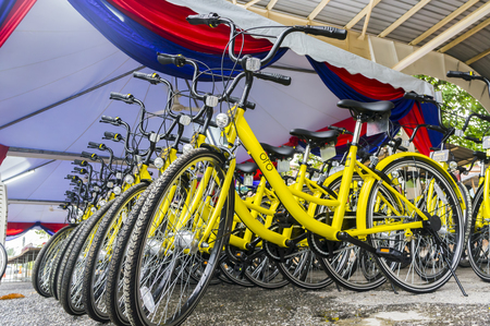 KUALA LUMPUR, MALAYSIA - September 9, 2017 : OFO bicycle close up. Founded in 2014 at China, OFO first in the world to introduce "non-docking" bike sharing platform operated by smartphone application.のeditorial素材