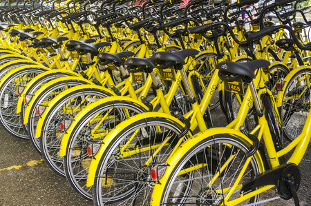 KUALA LUMPUR, MALAYSIA - September 9, 2017 : OFO bicycle close up. Founded in 2014 at China, OFO first in the world to introduce "non-docking" bike sharing platform operated by smartphone application.のeditorial素材