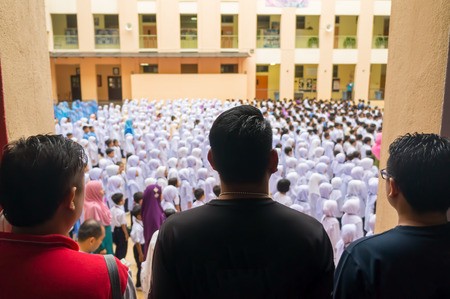 PUTRAJAYA, MALAYSIA - Jan 2, 2018 : Parents of primary school student together present first day school session 2018 at Putrajaya.のeditorial素材