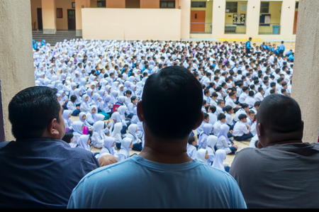 PUTRAJAYA, MALAYSIA - Jan 2, 2018 : Parents of primary school student together present first day school session 2018 at Putrajaya.のeditorial素材