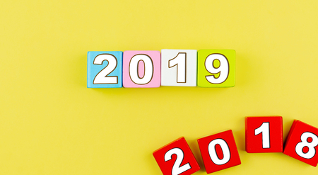 Wooden blocks with 2019 written on. Happy new yew concept. Copy space.