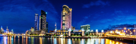 A beautiful view of Melbourne downtown across the Yarra river at night in Melbourne, Victoria, Australia.の写真素材