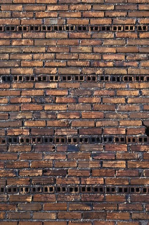 Rugged brick wall in an unfinished building