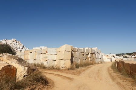 Marble blocks alongside a dirt road in the marble region of Borba, Alentejo, Portugalのeditorial素材