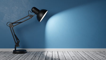 Black Desk Lamp on Wooden Floor Illuminating an Empty Blue Plastered Wall with Copy Space 3D Illustrationの写真素材