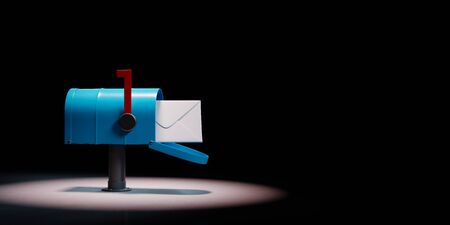 Blue Mailbox with Envelop Spotlighted on Black Background with Copy Space 3D Illustrationの写真素材