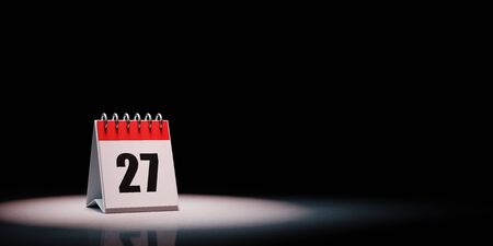 Red and White Single Day Desk Calendar Spotlighted on Black Background with Copy Space 3D Illustration, Day 27 of the Monthの写真素材