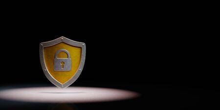 Metallic Shield Shape with Padlock Spotlighted on Black Background