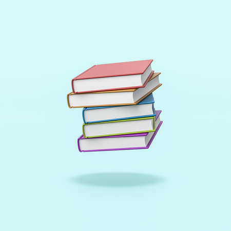 Stack of Colored Books on Blue Backgroundの写真素材