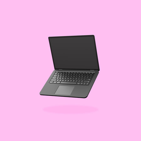 Black Laptop Computer on Flat Pink Backgroundの写真素材