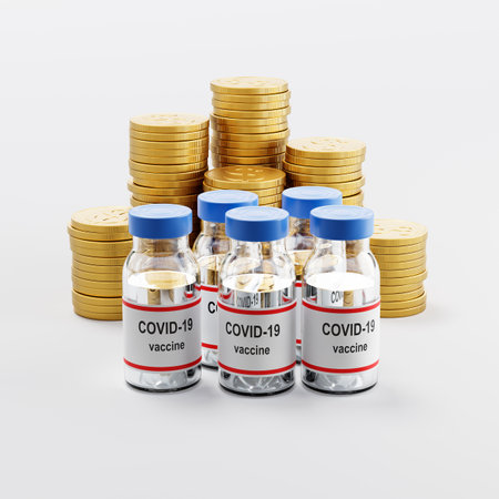 Covid 19 Vaccine Bottles ahead of Stacks of Coins on Light Gray Backgroundの写真素材
