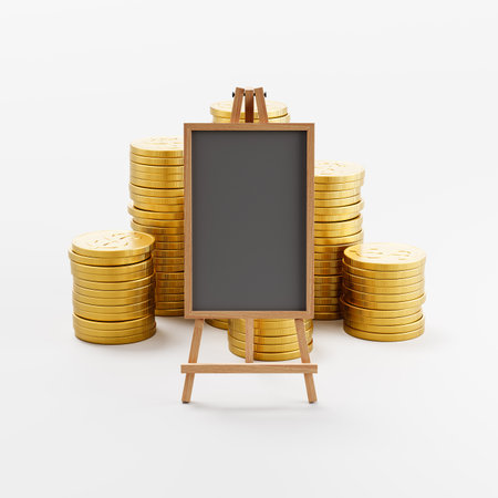 Blank Chalkboard ahead of Stacks of Coins on Light Gray Backgroundの写真素材