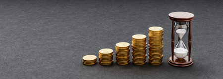 Rising Heaps of Coins on Dark Background with Hourglassの写真素材