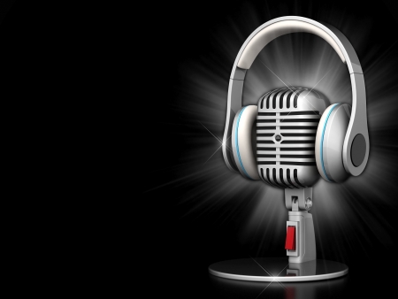 image of the old, chrome microphone on a black backgroundの写真素材