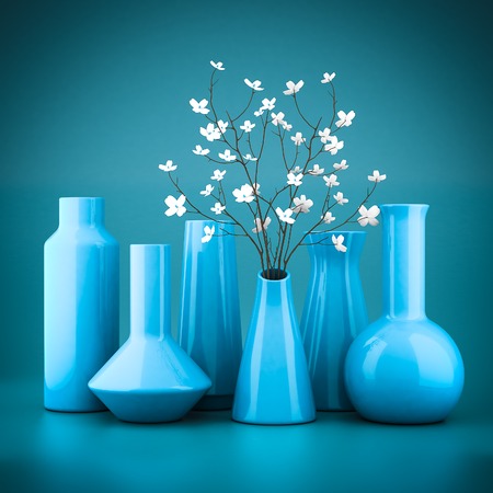set of porcelain vases on a blue backgroundの写真素材