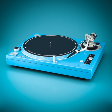 Beautiful DJ player on a blue backgroundの写真素材