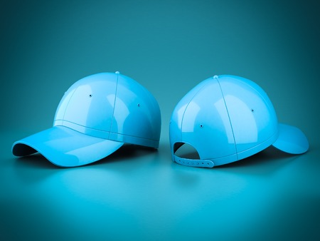 3D rendering baseball cap on blue backgroundの写真素材