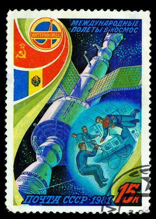 USSR  - CIRCA 1981: A stamp printed in The USSR  devoted to the international partnership between Soviet Union and Foreign countries in space, circa 1981.の写真素材