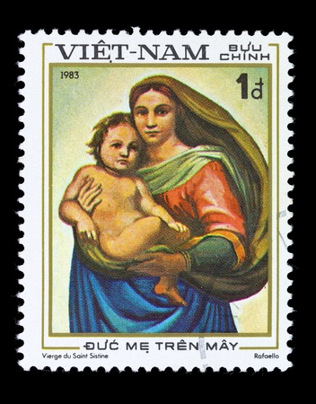VIETNAM - CIRCA 1983: A stamp printed in Vietnam shows a reproduction of Raphael paintings - Sistine Madonna, series, circa 1983の写真素材