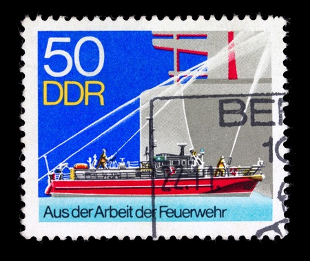 DDR - CIRCA 1974: stamp printed by ddr, shows warship, circa 1974の写真素材