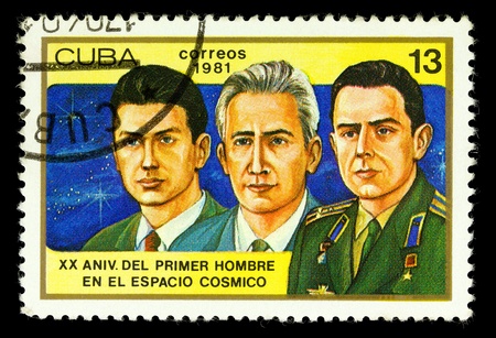 CUBA - CIRCA 1981: A stamp printed in the Cuba shows Team of spaceship Voskhod Komarov, Feoktistov and Egorov, one stamp from a series, circa 1981.の写真素材