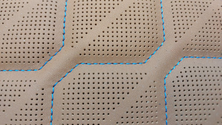 Leather stitched with perforated pattern, texture or backgroundの写真素材