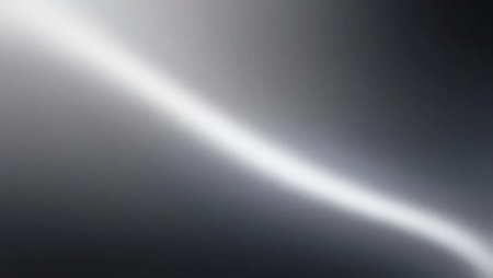 A monochromatic gradient moving from light grey to deep black, offering a sleek lookの素材