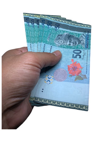 Hand pick Malaysian Ringgit (MYR) Banknote RM50 isolated on white background.