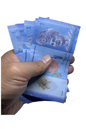 Hand pick Malaysian Ringgit (MYR) Banknote RM1 isolated on white background.
