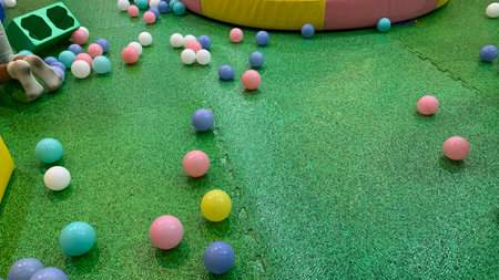 The image shows a vibrant indoor playground, likely a section of a larger play area designed for...