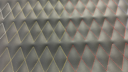 Modern black leather pattern with stitched rhombus design adds elegance and style to any project