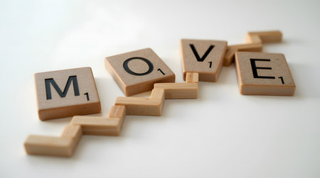 Creative blocks spelling "Move" spur innovative thinking, inspiring action and progressの素材
