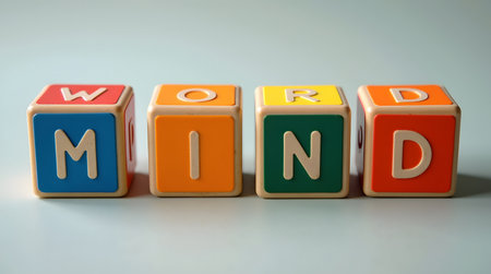 Colorful wooden blocks spell out the word mind for creative conceptsの素材