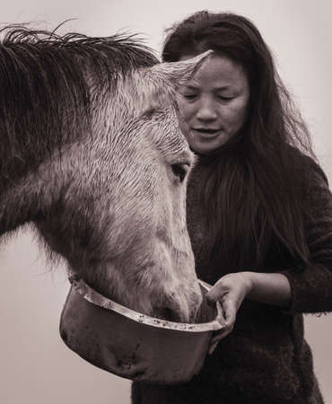 A local people with his horse and foodのeditorial素材