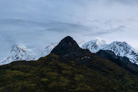 a beautiful mountain view with fog and cloudsの写真素材
