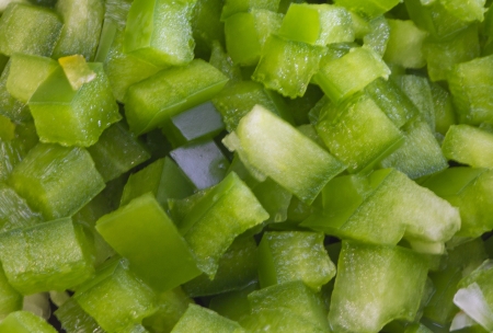 chopped pieces of green pepperの写真素材