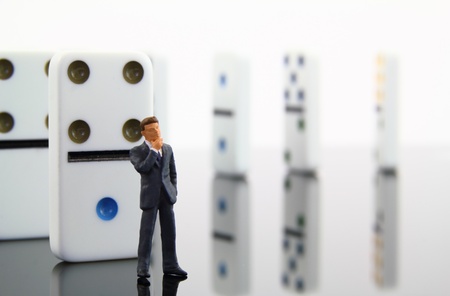 Business man character contemplating a chain of events の写真素材